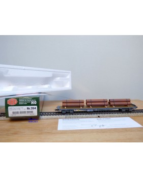 HAG 354 . 04 , wagon plat  à ranchers type Rs chargé de conduites de gaz  SBB  BO