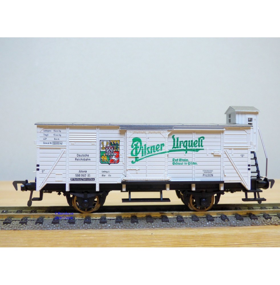 FLEISCHMANN 5357,  wagon couvert  à guérite  PILSNER URQUELL    DR   neuf  BO